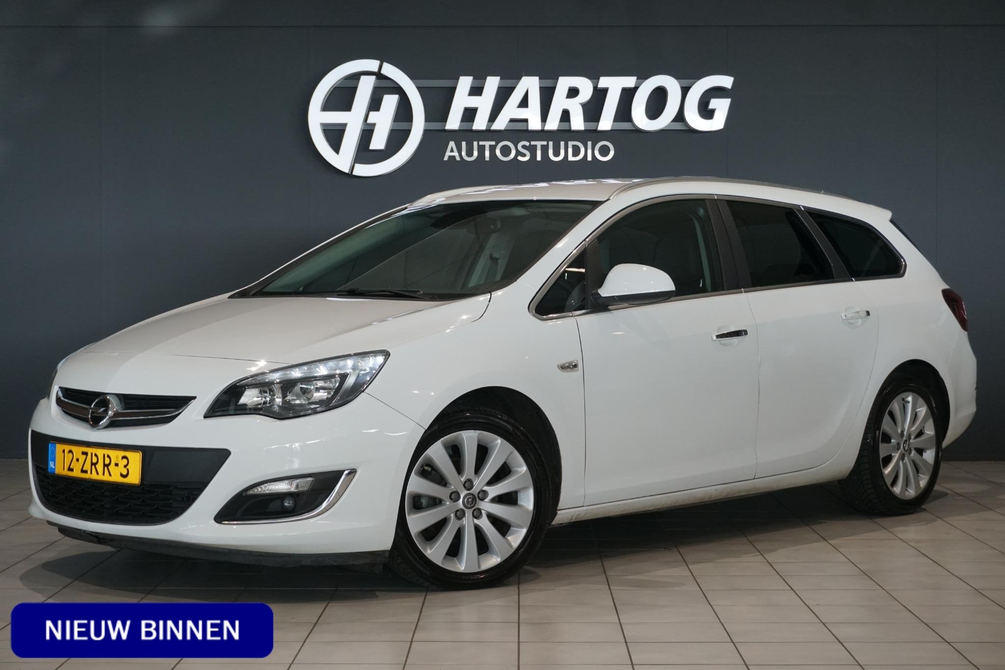 Opel Astra Sports Tourer 1.3 CDTi S/S Cosmo *153.344 NAP* +, Auto's, Voorwielaandrijving, Euro 5, Gebruikt, Zwart