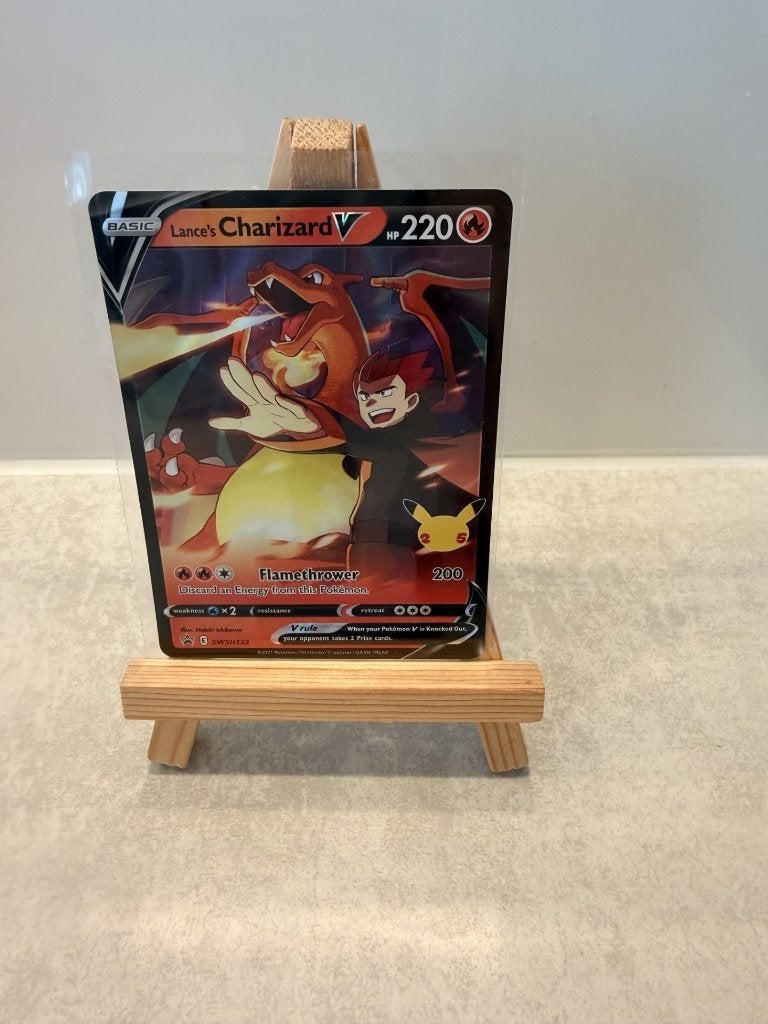 ** Charizard 8/9 -Lance's Charizard SWSH Black Star Promos**, Ophalen of Verzenden, Zo goed als nieuw