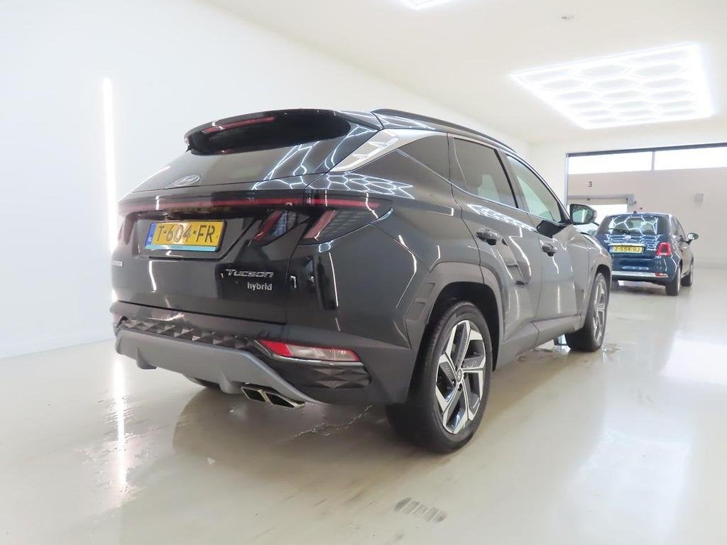 HYUNDAI TUCSON 1.6 T-GDI HEV PREMIUM I AUTOMAAT I 360 CAMERA, 4 cilinders, Met garantie (alle), 1650 kg, Zwart