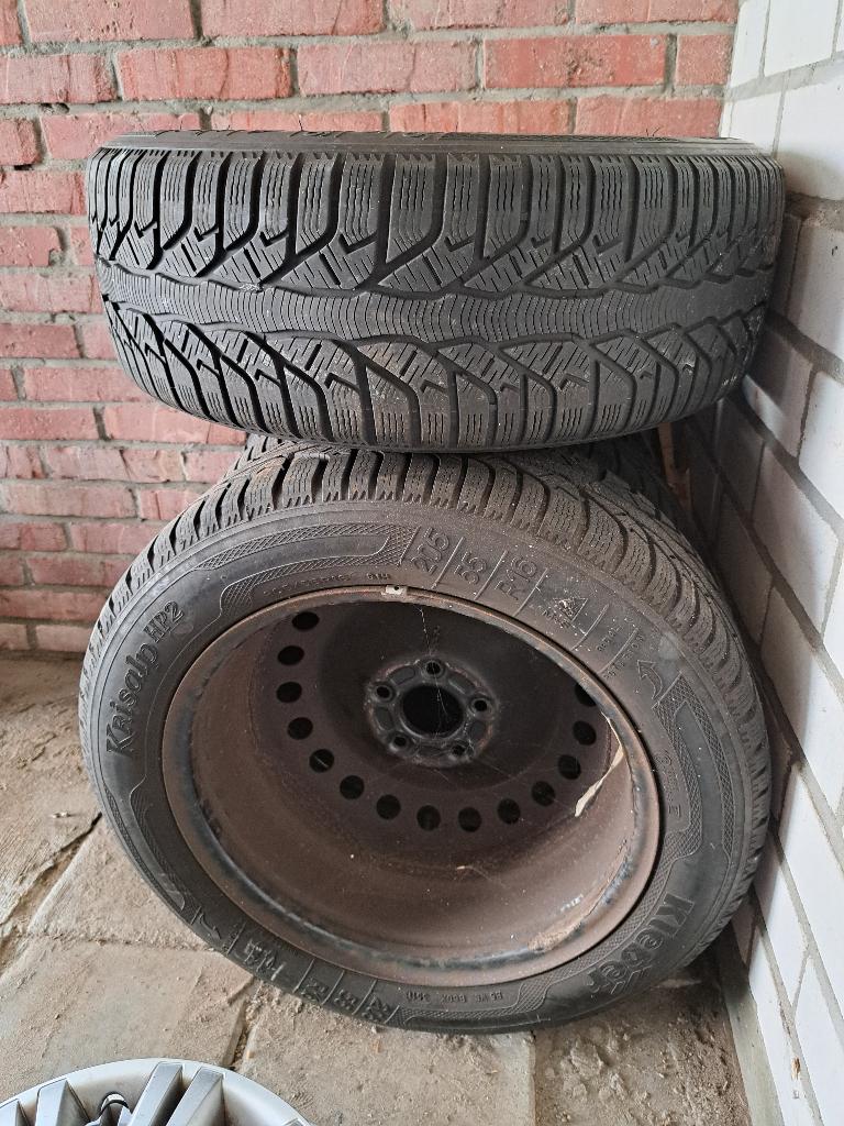 4 winterbanden met velgen en siervelgen, Ophalen
