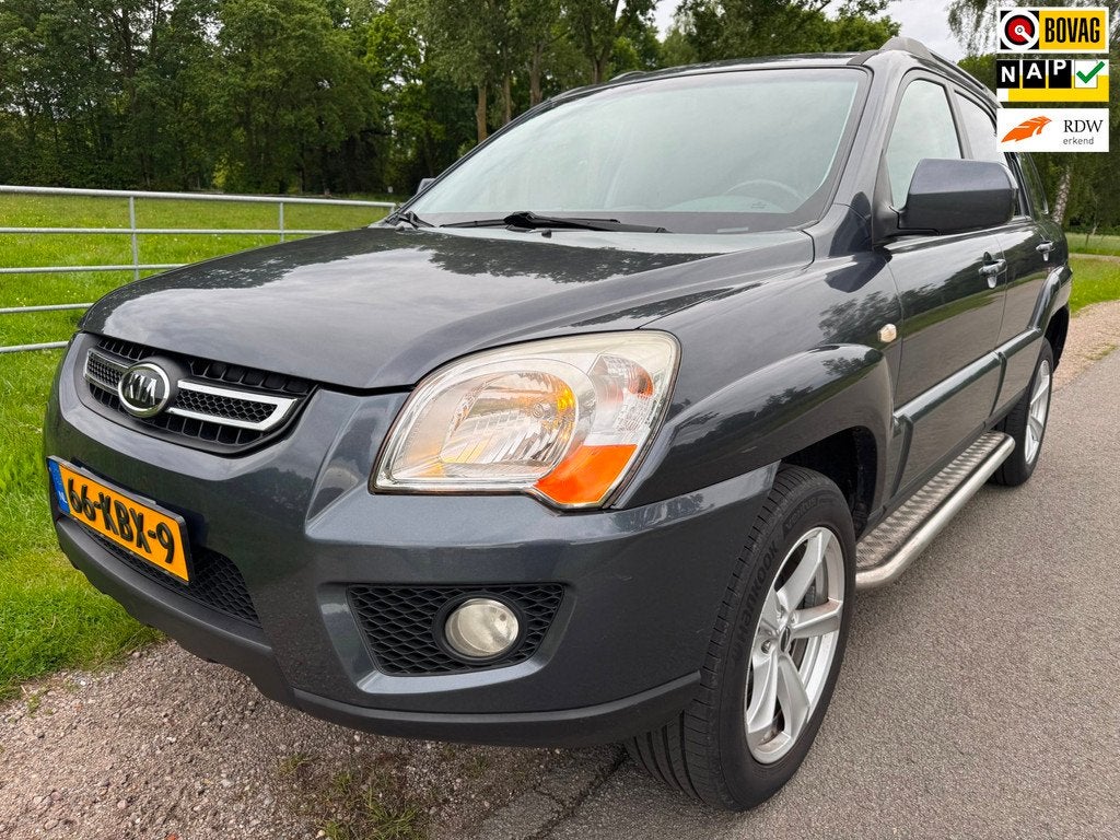 Kia Sportage 2.0 CVVT X-ecutive 4WD keurig onderhouden|navig, Auto's, Kia, Keurmerk '100% Onderhouden', Stof, Gebruikt, 4 cilinders