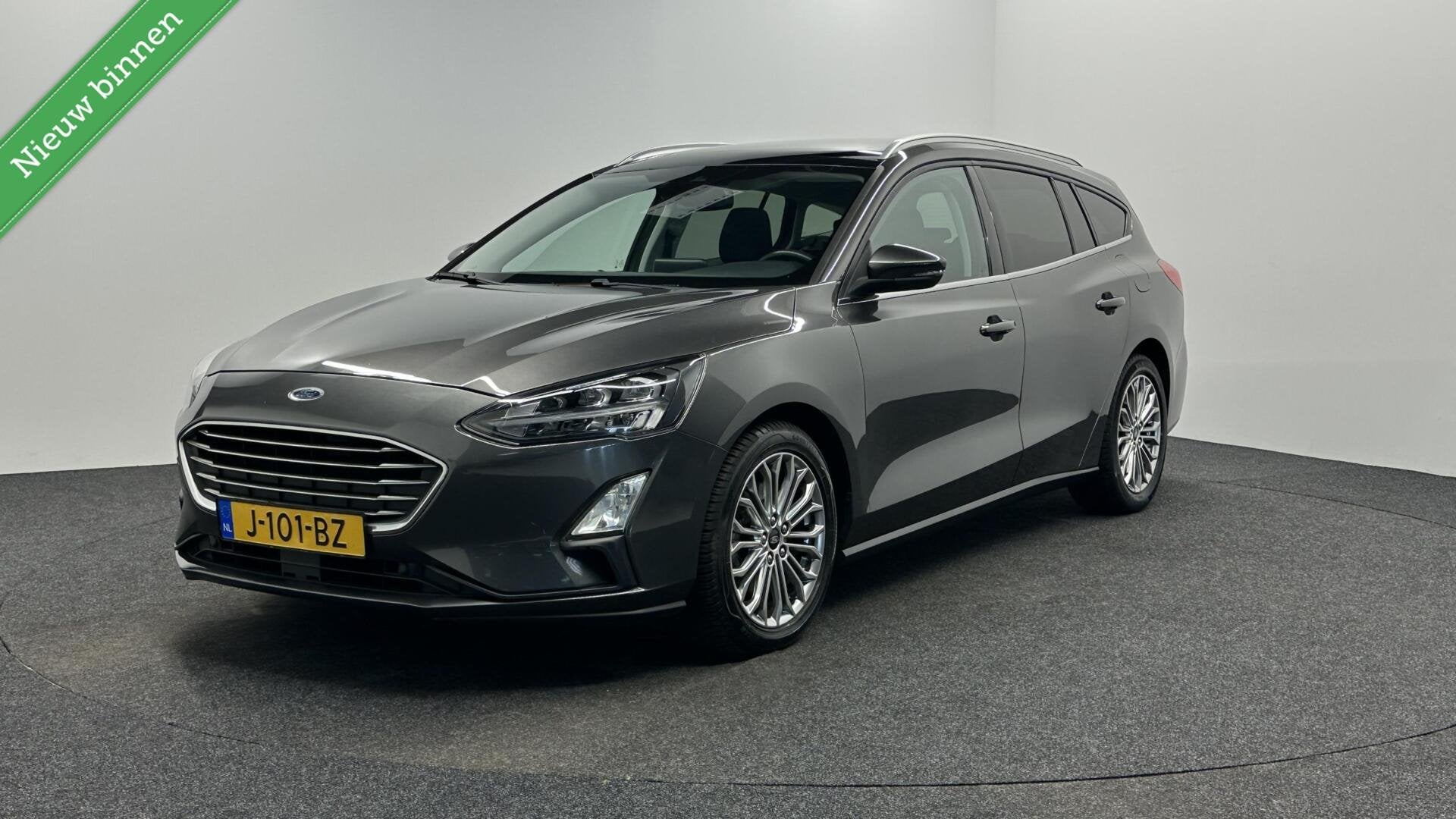 Ford Focus Wagon 1.0 EcoBoost Titanium Business PANO TREKHAA, Auto's, Gebruikt, Automatische klimaatregeling, 1283 kg, Origineel Nederlands