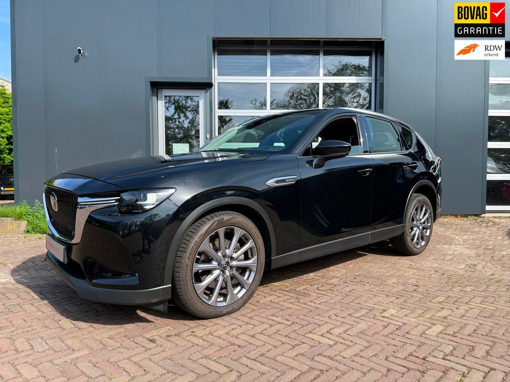Mazda CX-60 2.5 e-SkyActiv PHEV Exclusive-Line All-in prijs, Auto's, Mazda, Stof, Gebruikt, Zwart, 4 cilinders