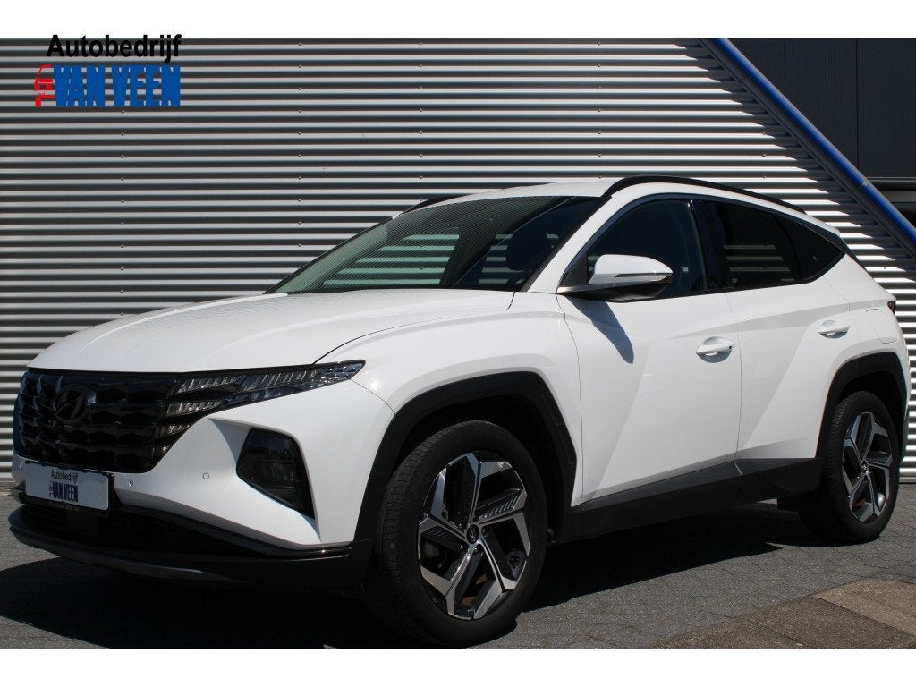 Hyundai Tucson 1.6 T-GDI HEV Comfort Smart | 19 inch | Camer, Auto's, Gebruikt, Zwart, 4 cilinders, 1650 kg
