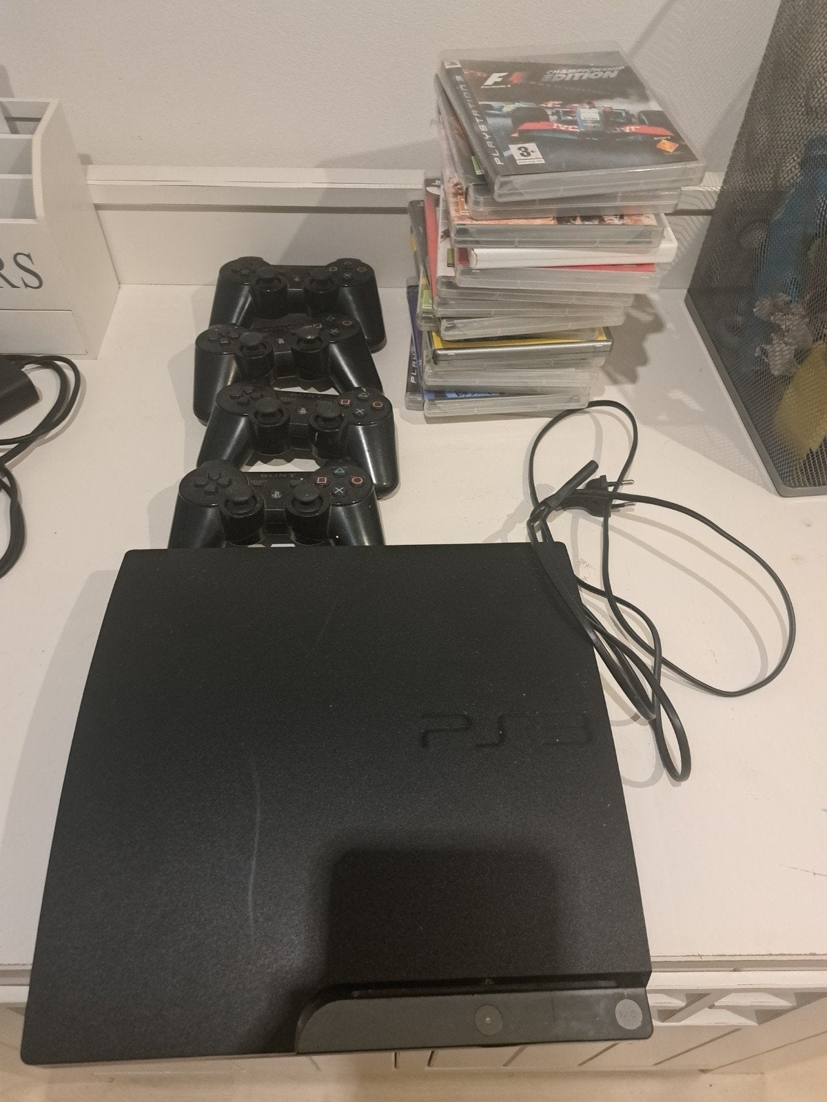 PlayStation 3 met 4 controllers en 13 spellen, Gebruikt, Eén computer, 3 spelers of meer, Vanaf 12 jaar