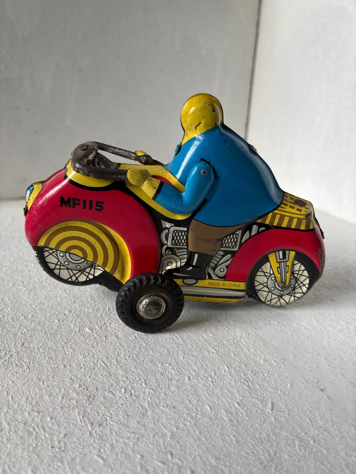 Vintage MF115 blikken speelgoedmotor met opwindmechanisme, Antiek en Kunst, Ophalen of Verzenden
