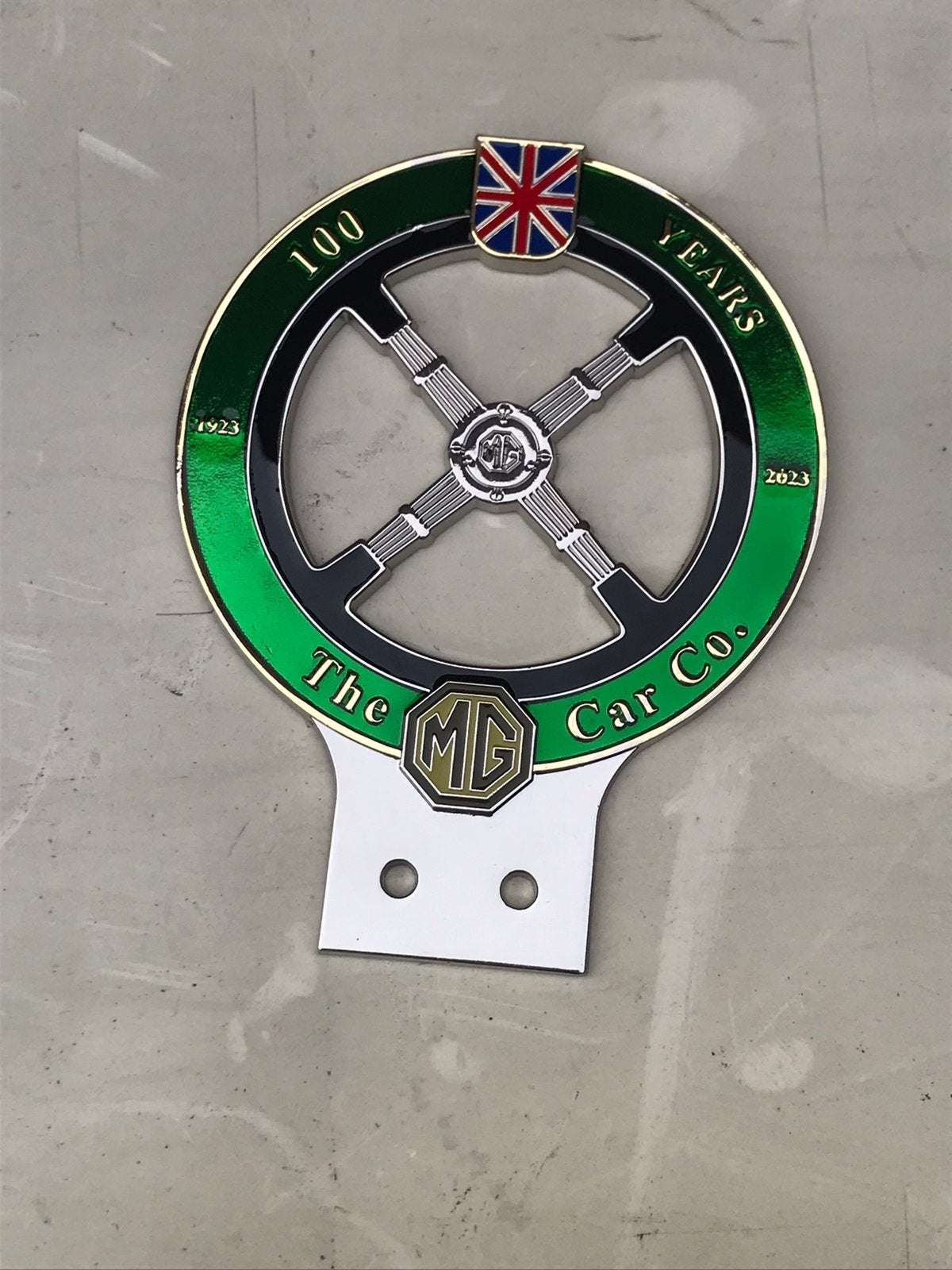 MG 100 jaar reclame bordje badge, Ophalen of Verzenden, Zo goed als nieuw, Reclamebord
