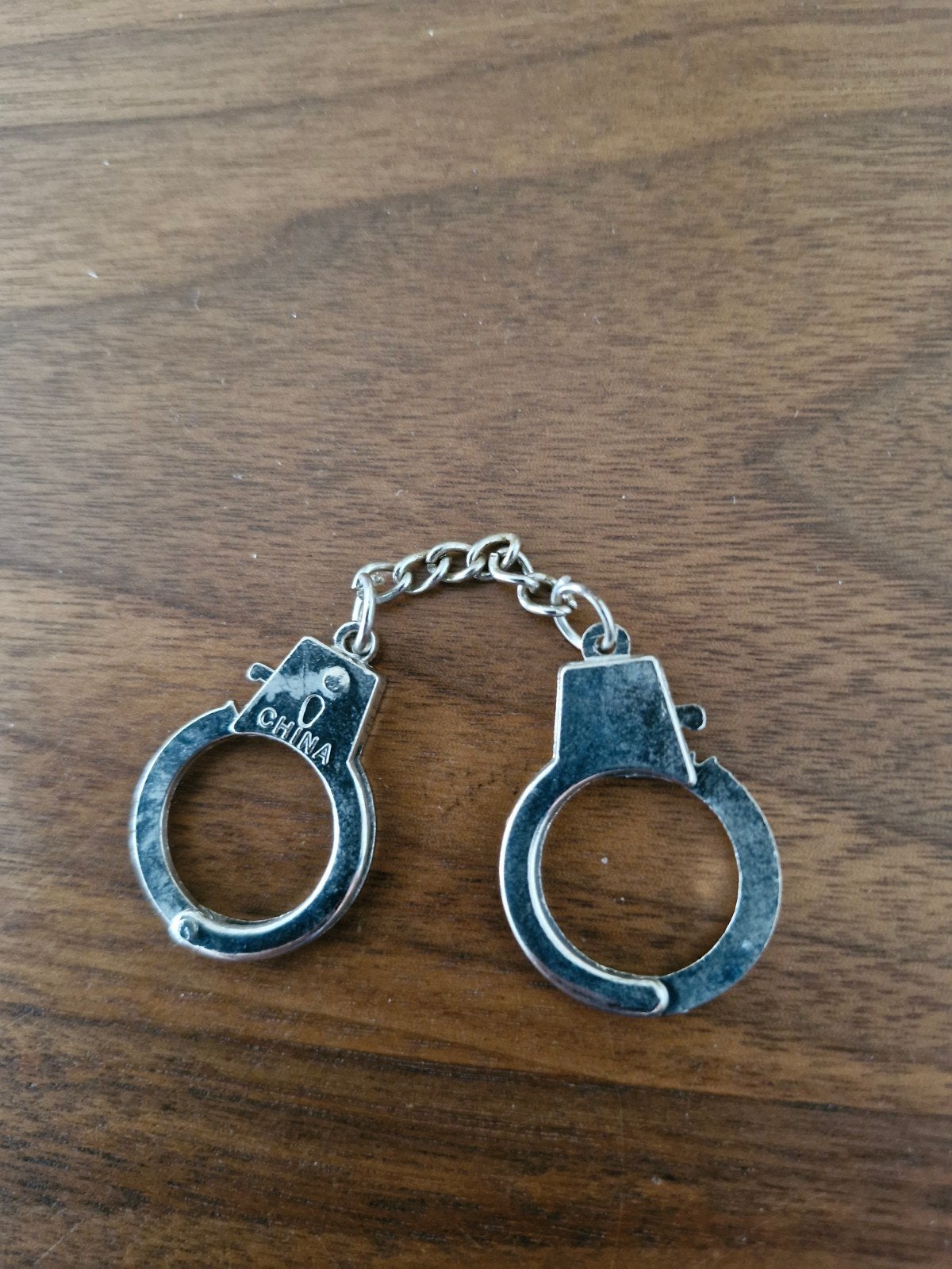 173 Mini handboeien sleutelhanger -, Verzamelen, Ophalen of Verzenden, Gebruikt, Overige typen
