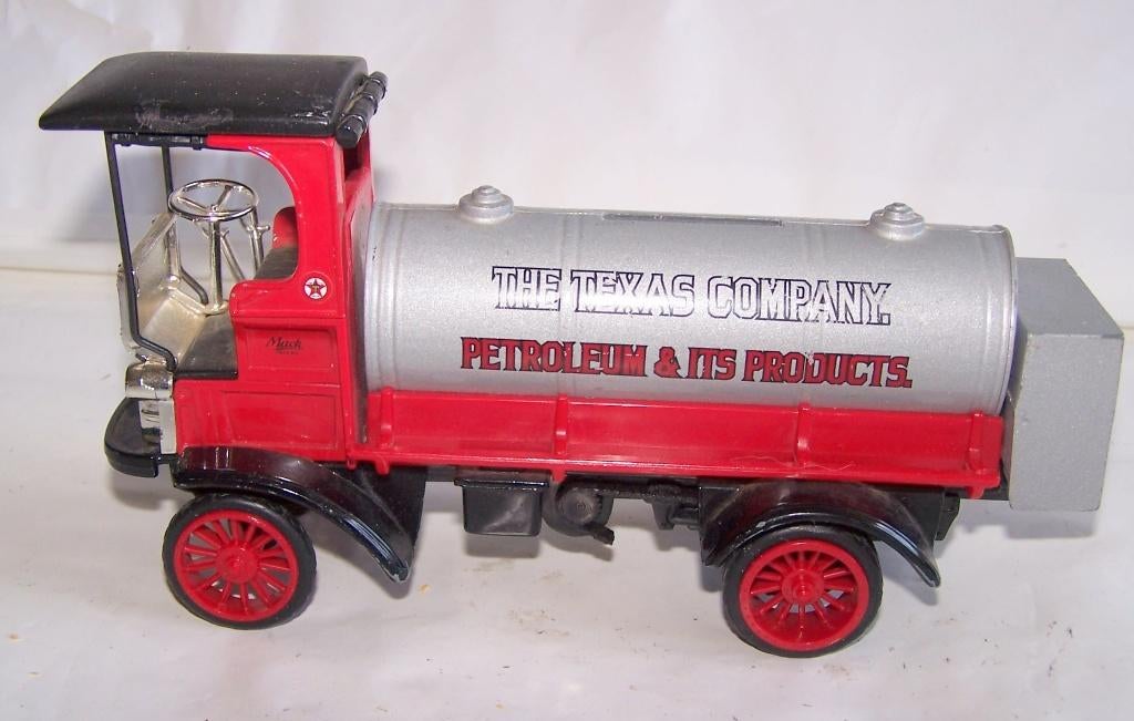 ERTL 1910 Mack TexacoTanker Truck/spaarpot. 1995. Zeldzaam., Hobby en Vrije tijd, Modelauto's | 1:43, Ophalen of Verzenden, Zo goed als nieuw