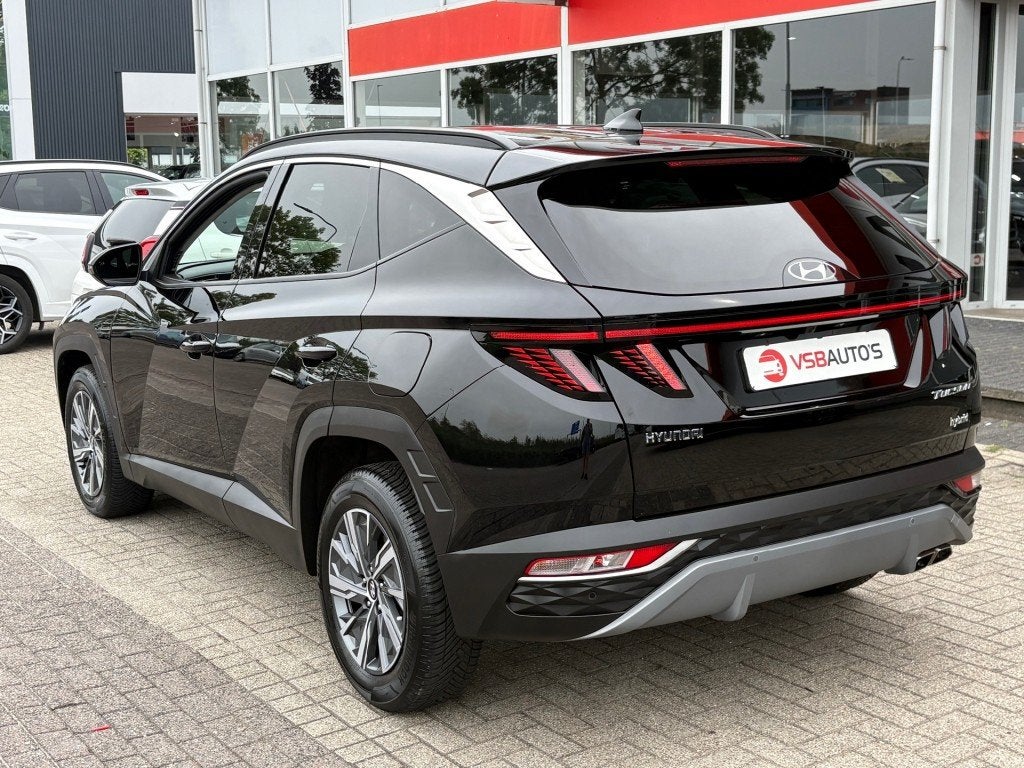Hyundai TUCSON 1.6 T-GDI HYBRID 230PK AUT. LED NAVI CAMERA C, Auto's, Hyundai, Gebruikt, Huisgarantie, Met garantie (alle), Zwart