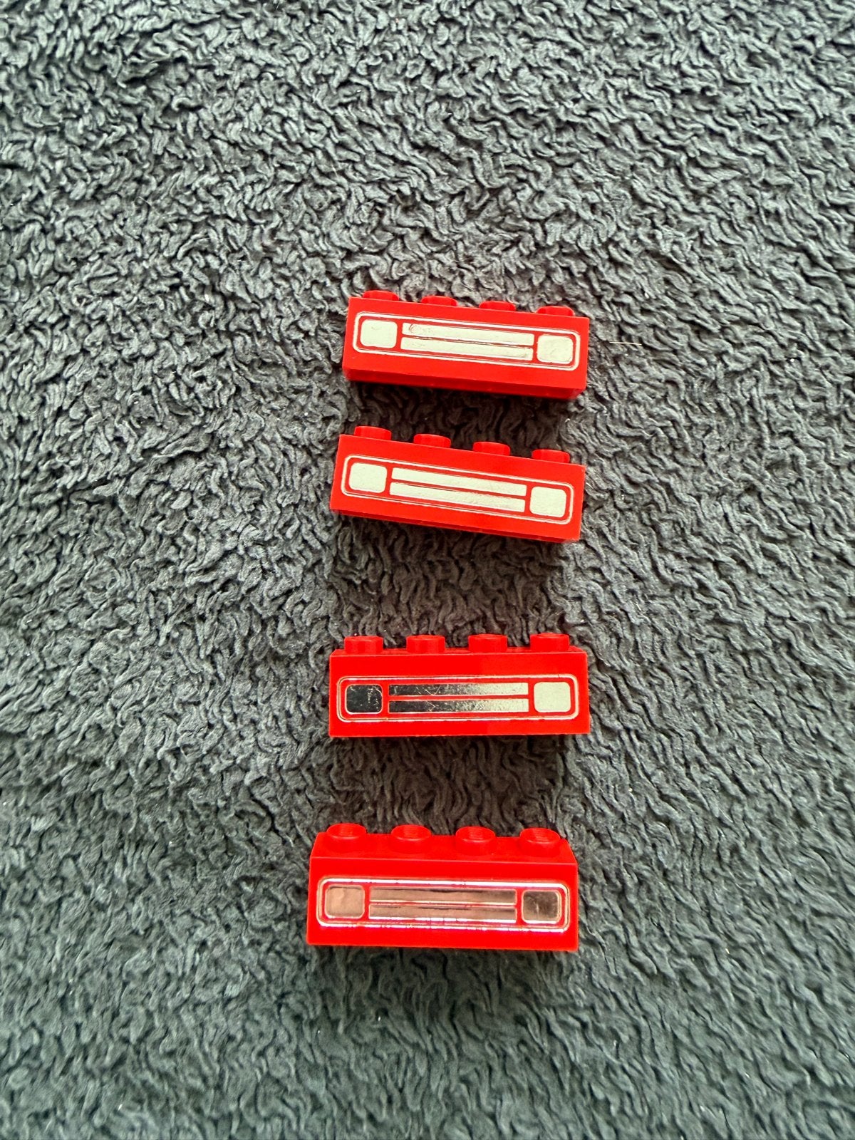 Lego 1x4 steentjes met bedrukking (4 stuks), Ophalen of Verzenden, Gebruikt
