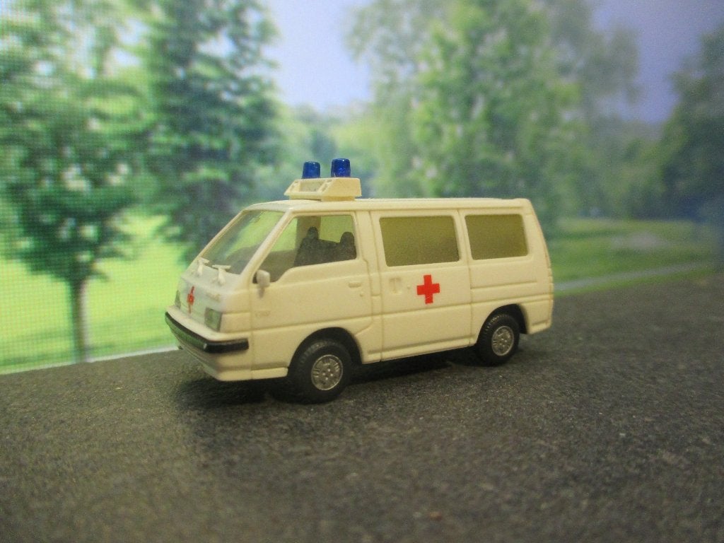 1987-1998 Mitsubishi L300 met matglas - Rietze Ambulance, Hobby en Vrije tijd, Modelauto's | 1:87, Ophalen of Verzenden, Gebruikt