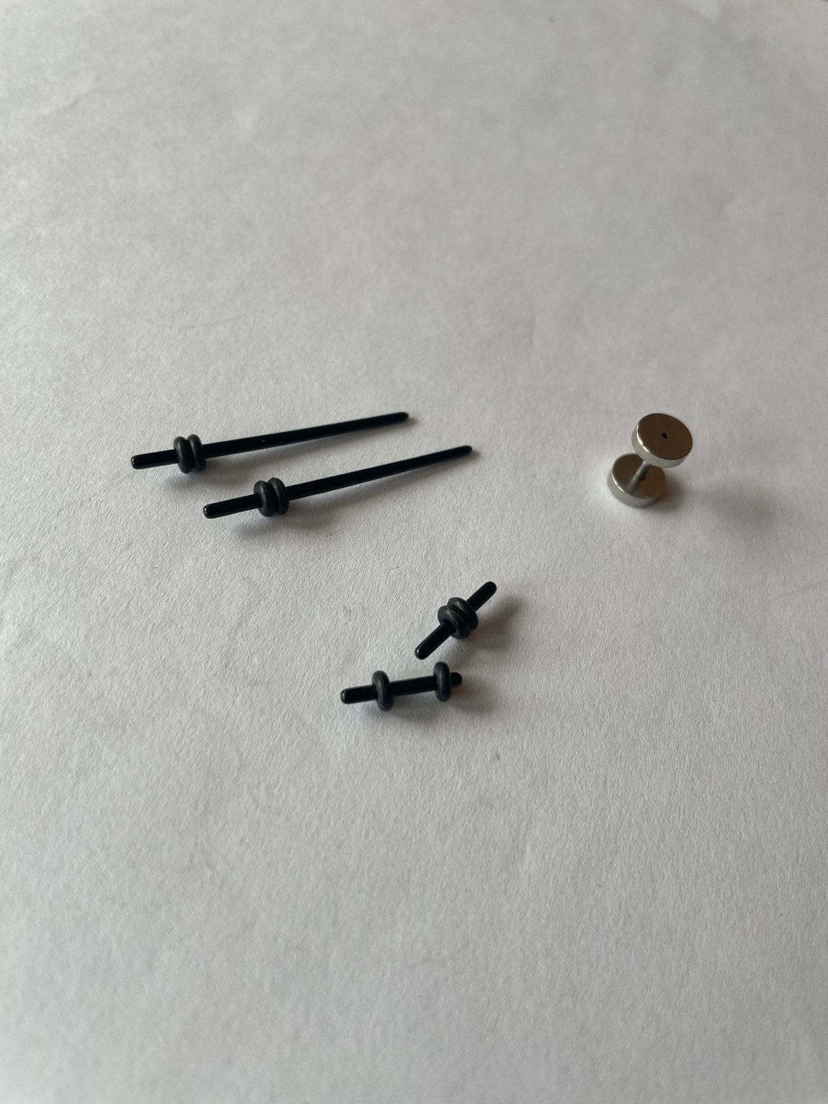 Piercing set: stretch set, tapers, oorbellen en tunnel, Ophalen of Verzenden, Gebruikt, Overige materialen, Oor- of Traguspiercing