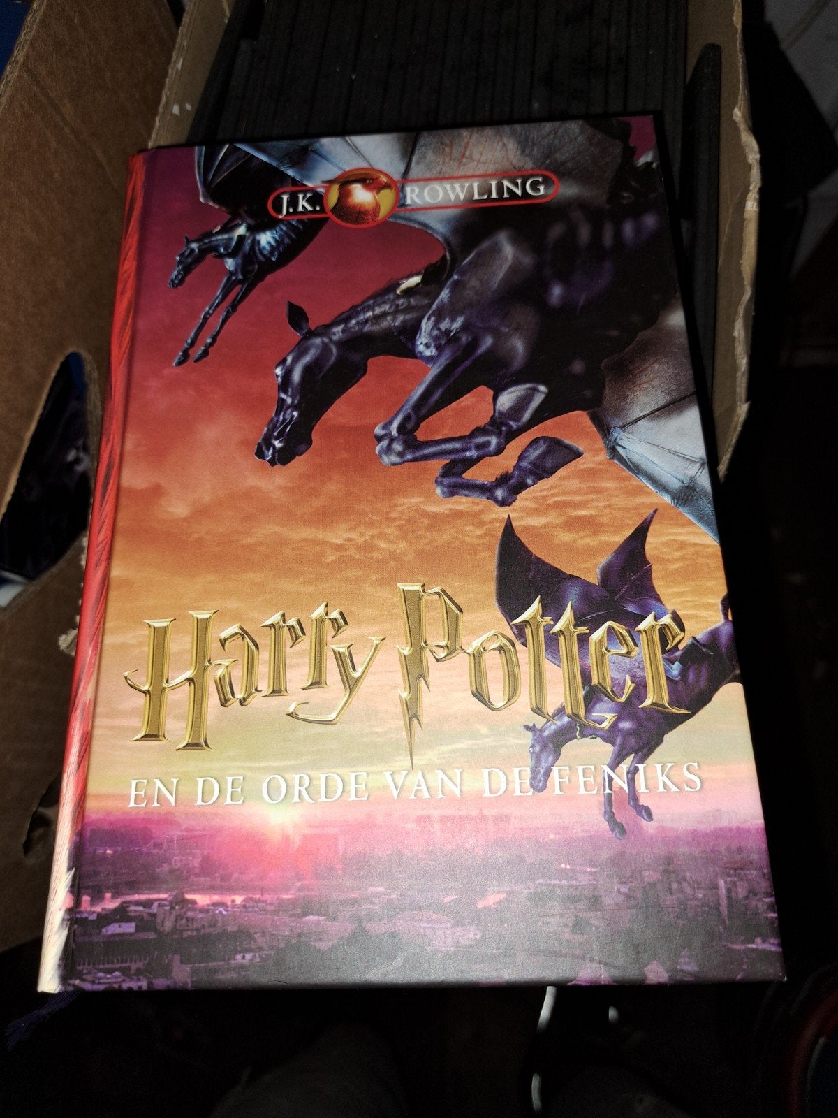 Harry Potter en de Orde van de Feniks - J.K. Rowling, Ophalen of Verzenden, Gelezen, J.K. Rowling