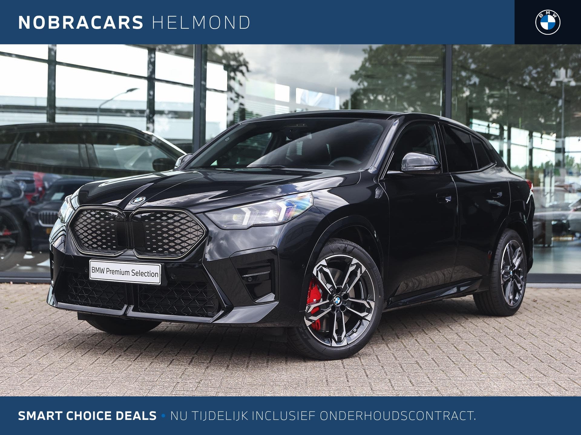 BMW iX2 eDrive20 M Sport / Panoramadak / Trekhaak / Sportsto, Auto's, BMW, Dealer onderhouden, IX2, Met garantie (alle), Zwart