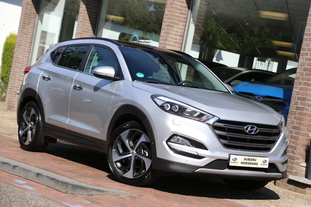 Hyundai Tucson 1.6 T-GDi Premium 4WD Schuifdak Leer Navi Cam, Auto's, Hyundai, 12 maanden, Gebruikt, 4 cilinders, Leder