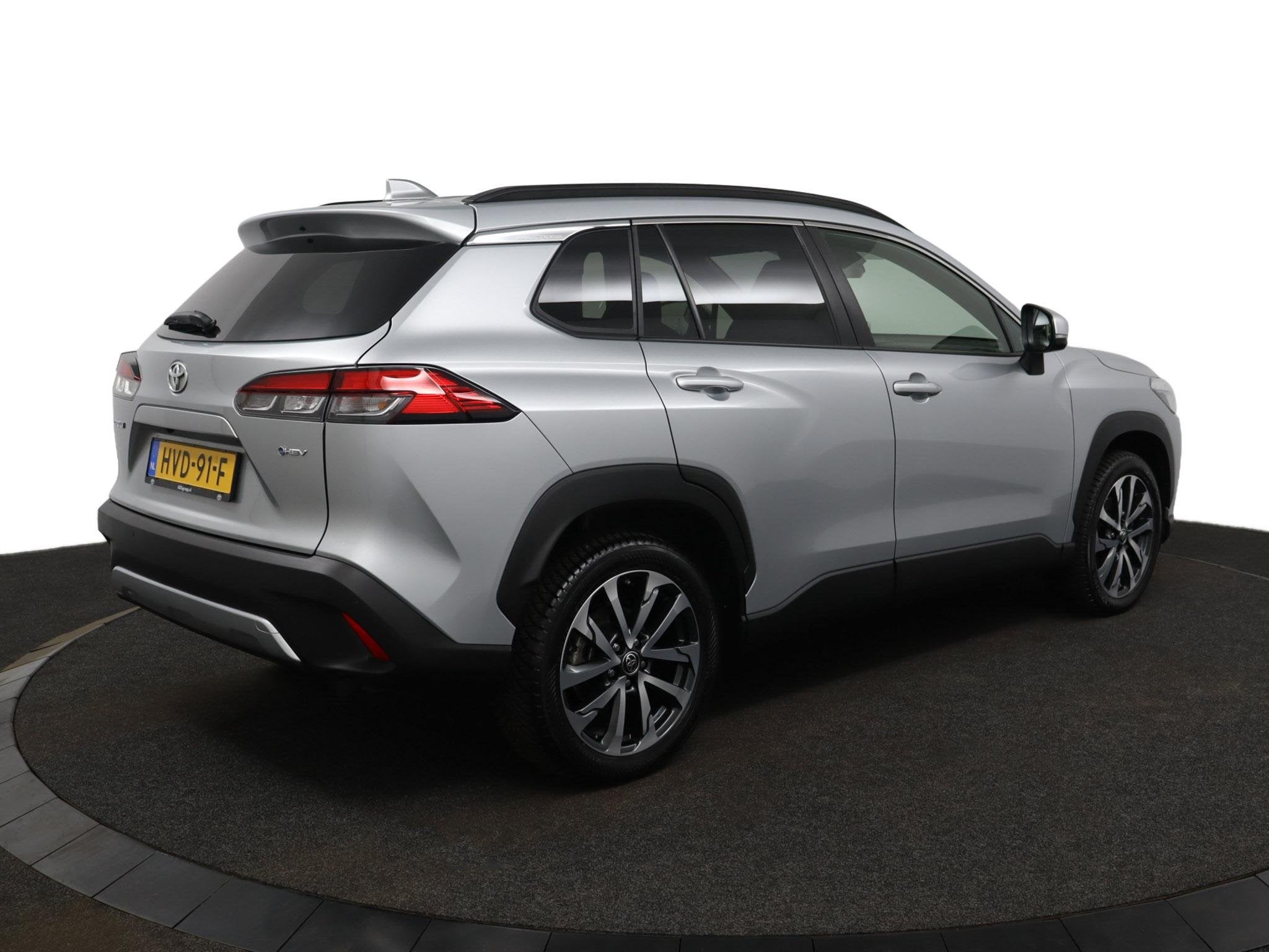 Toyota Corolla Cross Hybrid 140 Style | Elektrisch bedienbar, Auto's, Stof, Gebruikt, 4 cilinders, Parkeersensor