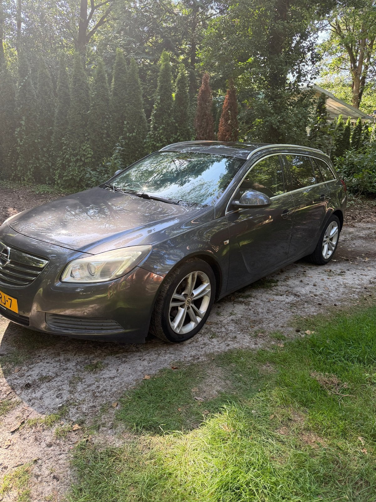 Opel Insignia 1.8 103KW Sports Tourer 2009 Grijs, Auto's, 1350 kg, 4 cilinders, 1796 cc, Origineel Nederlands