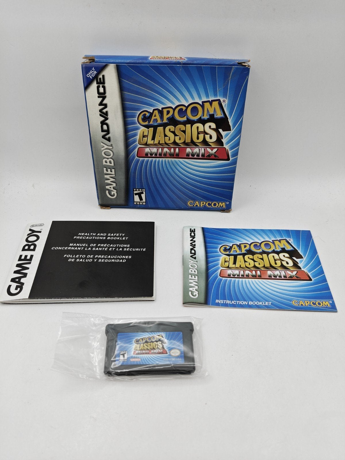 Capcom Classics Mini Mix GameBoy Advance (GBA) CIB, Capcom U.S.A., Inc. 1800 Gateway Drive, Suite 100, San Mateo, CA 94404, USA