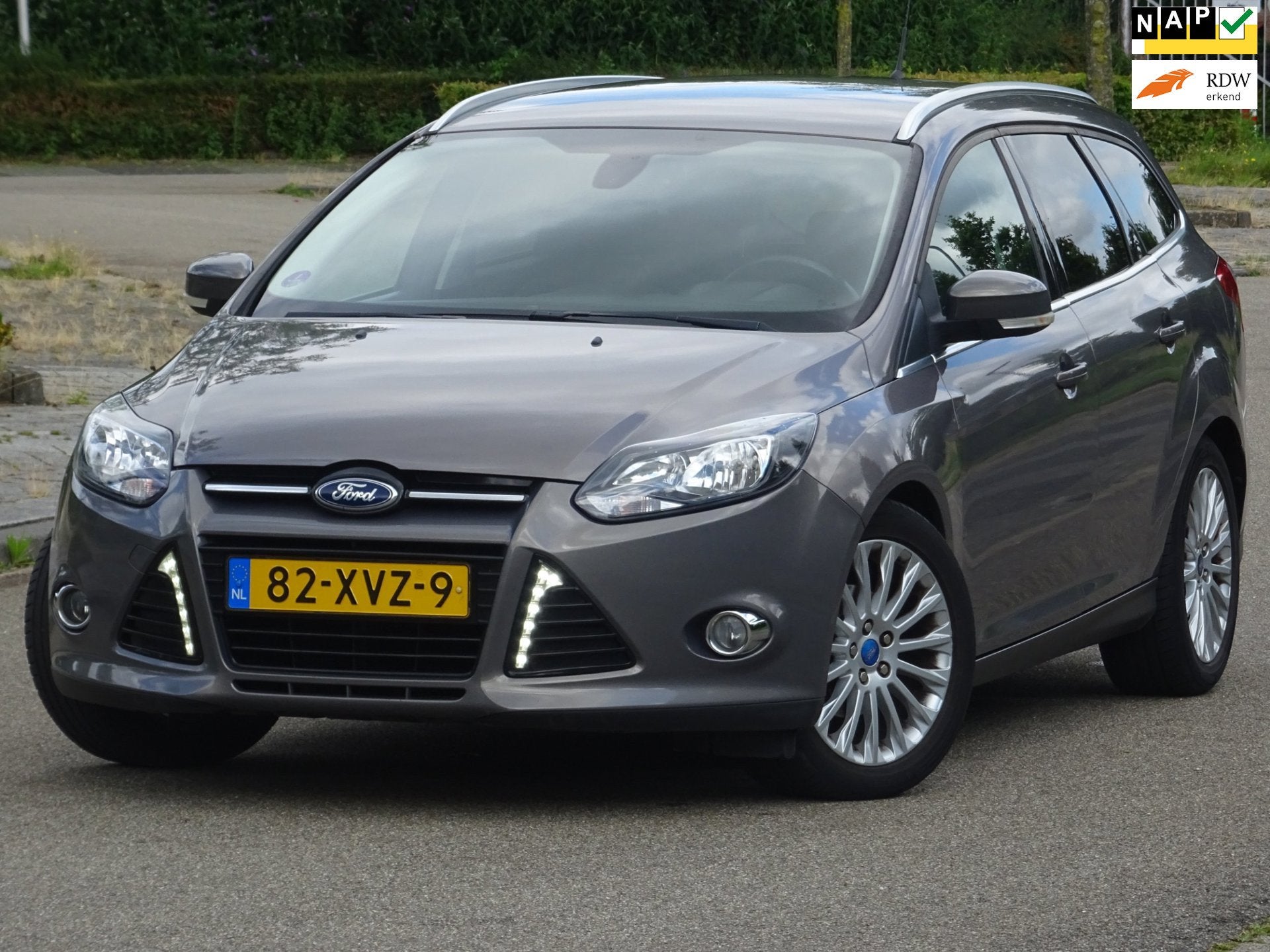 Ford Focus Wagon 1.0 EcoBoost Titanium NAP/NAVI/CRUISE/PDC, 125 pk, Gebruikt, Bruin, Origineel Nederlands
