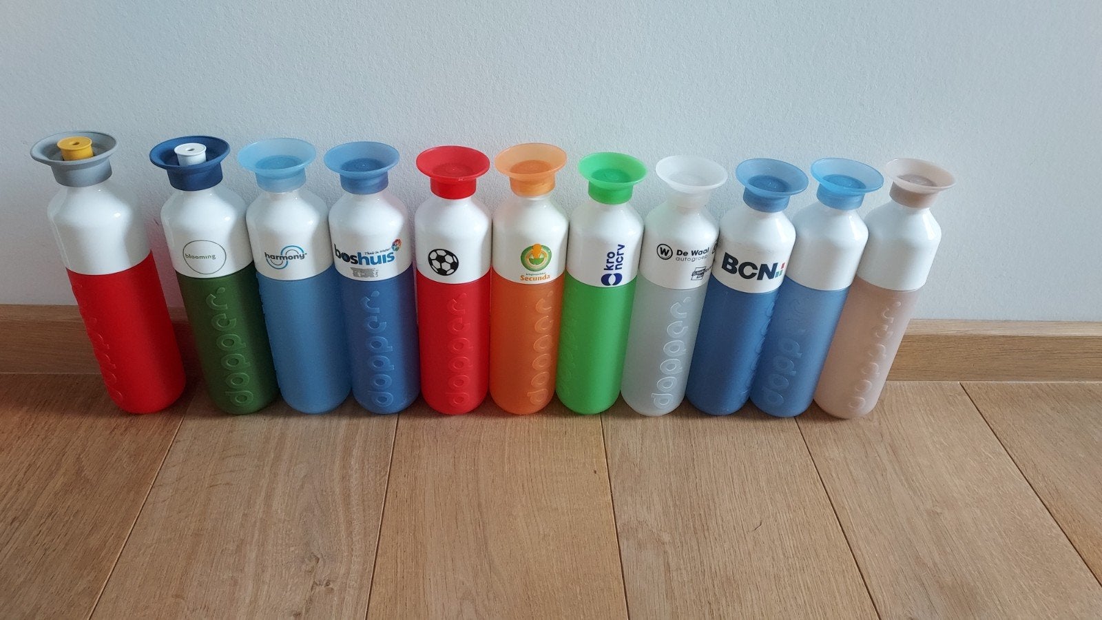11 Doppers, waarvan 2 met sportdop en 8 met reclame opdruk, Ophalen of Verzenden
