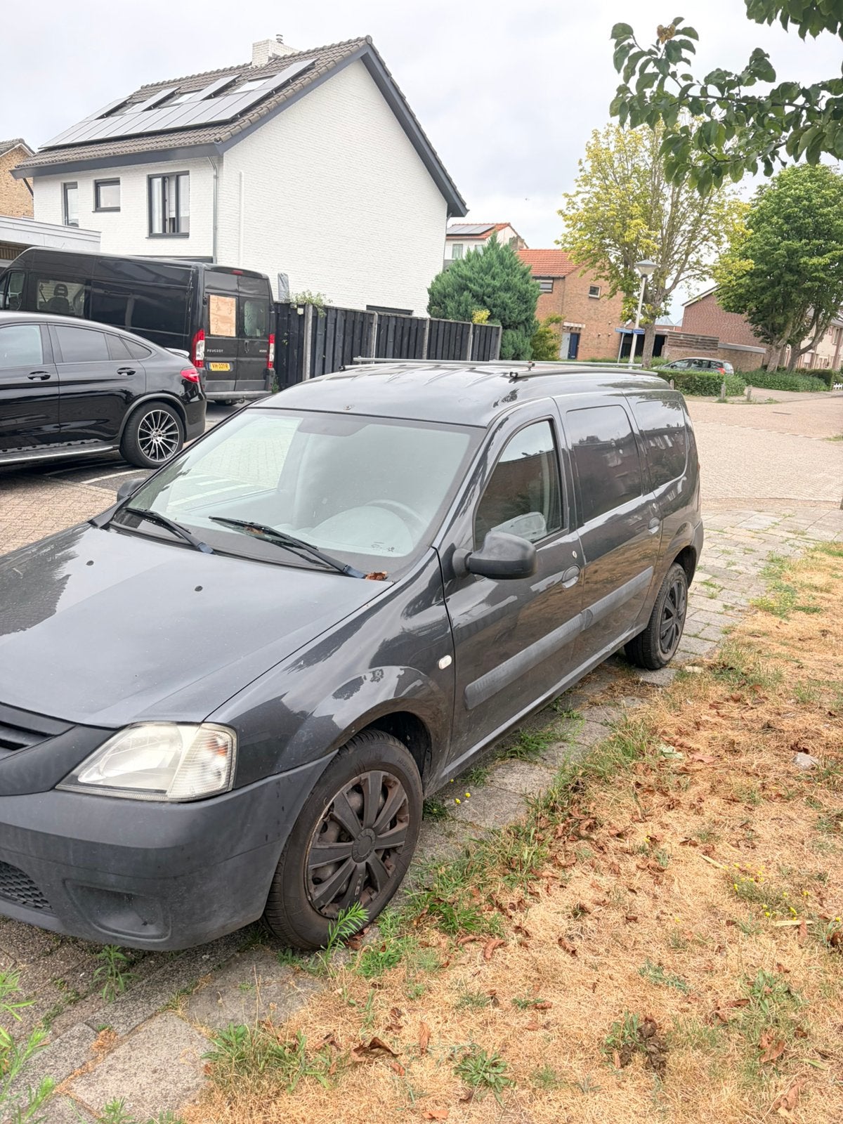 Dacia Logan 1.6 grijs kenteken
