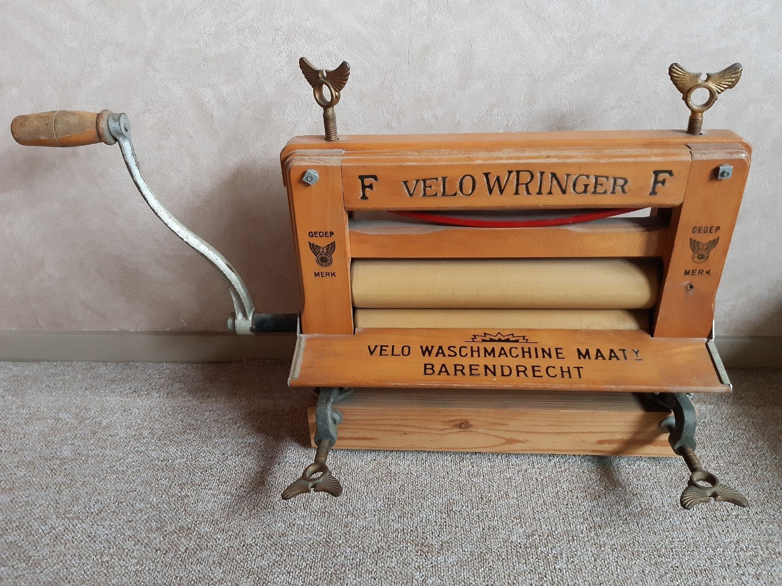 Velo wringer voor was, Ophalen