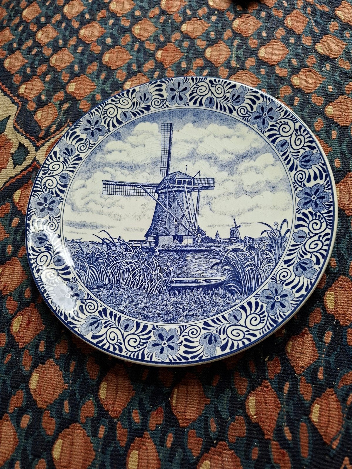 Delfts blauw wandbord, Ophalen