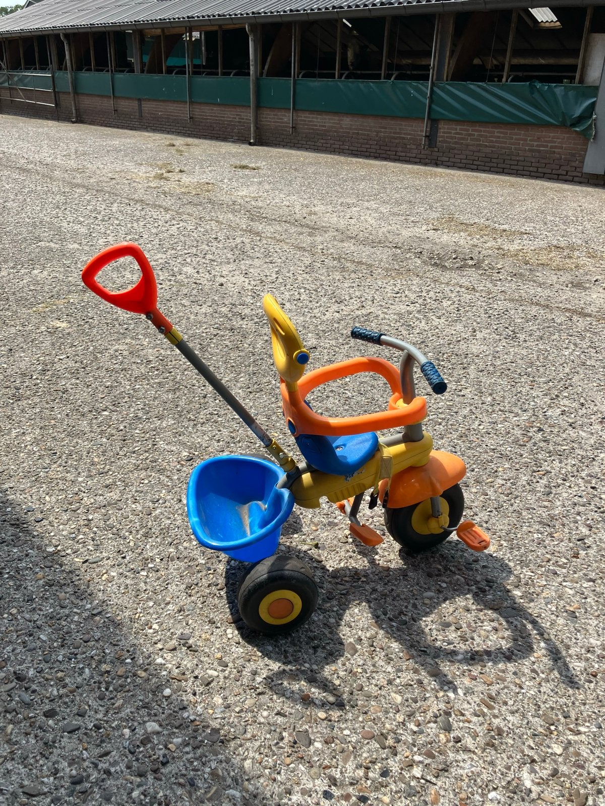 Kinder driewieler met duwstang - Oranje/Geel/Blauw, Ophalen, Gebruikt, Terugtraprem, Duwstang