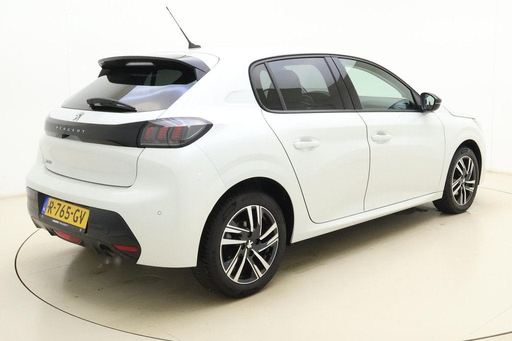 Peugeot 208 1.2 PureTech Allure Pack 100 pk | Navigatie | LM, 101 pk, Gebruikt, Euro 6, Leder en Stof