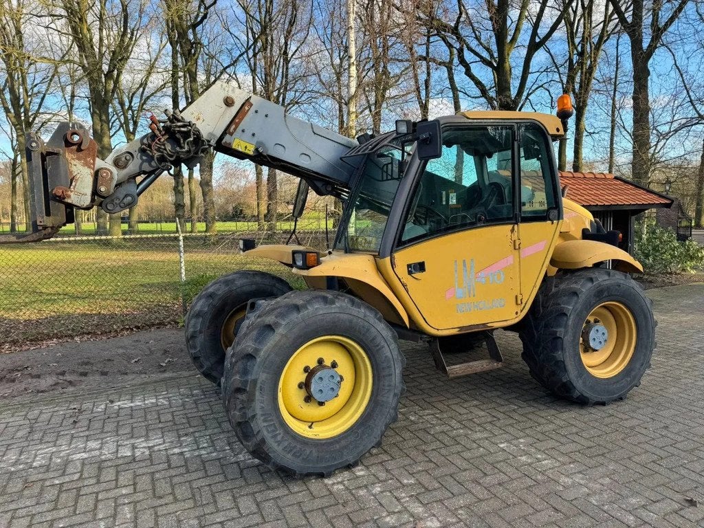 New Holland lm410 verreiker shovel loader (bj 1999), Zakelijke goederen, Machines en Bouw | Kranen en Graafmachines, Verreiker