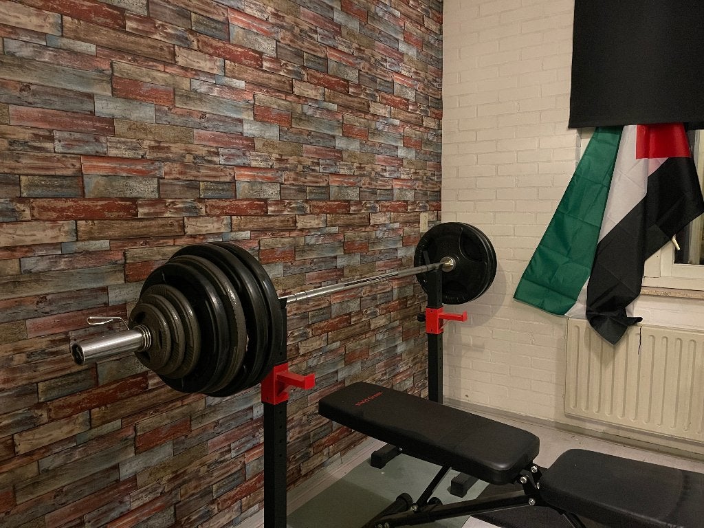 Foto 2 van Complete bankdruk set met stang en 147.5 kg aan gewichten