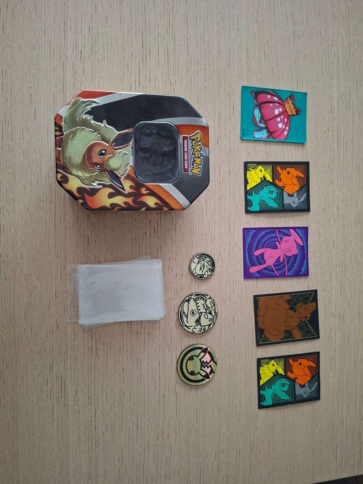 Pokémon kaarthoesjes, munten en tin box, Ophalen of Verzenden, Gebruikt, Sleeves of Kaarthoesjes