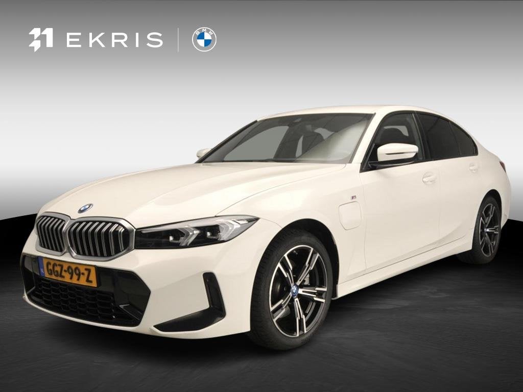 BMW 3 Serie Sedan 320e | M-Sportpakket | LED | Navigatie | S, Gebruikt, 4 cilinders, Met garantie (alle), Verwarmde buitenspiegels
