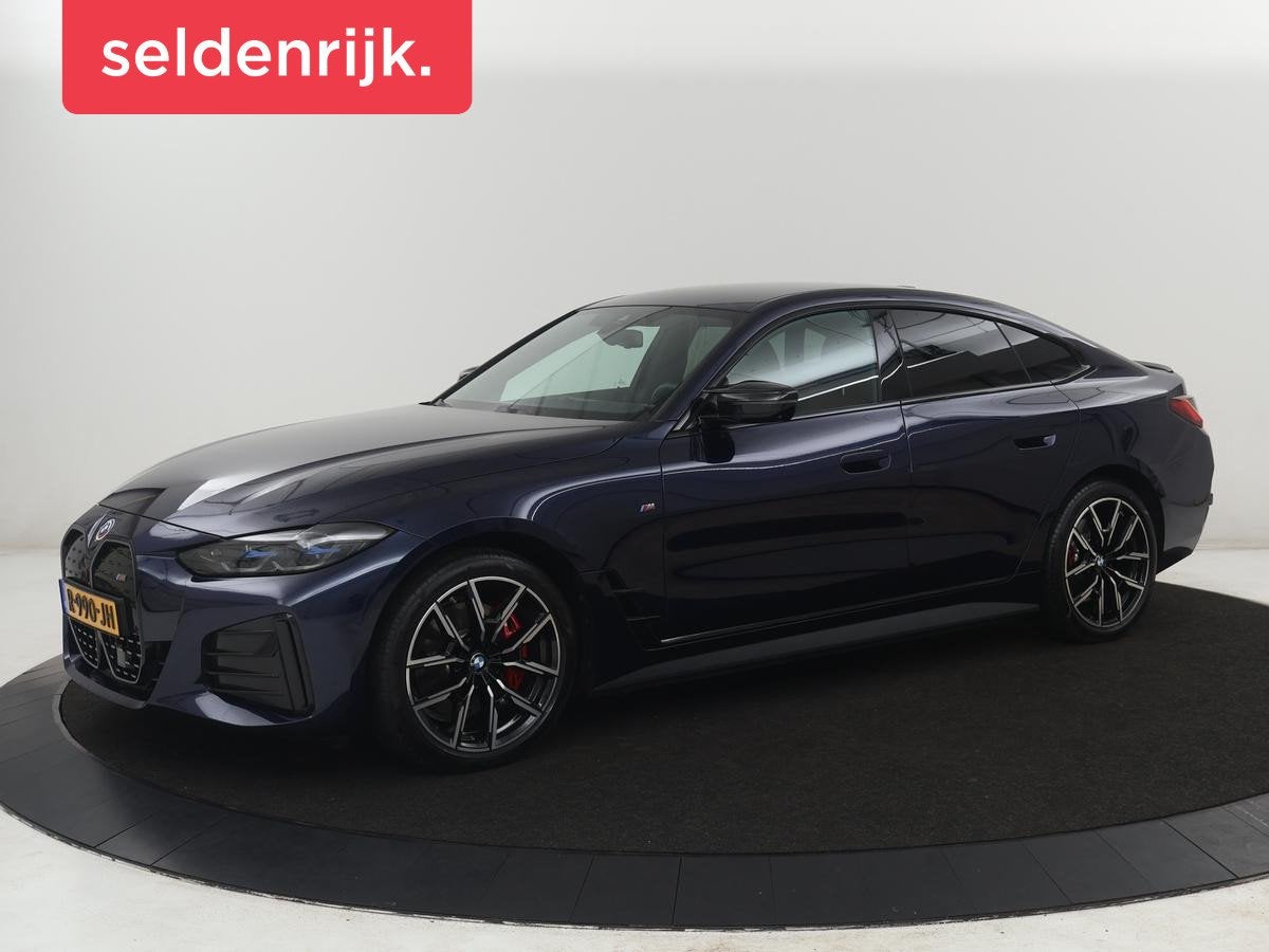 BMW i4 M50 High Executive 84 kWh | SOH 94,4% | Leder | Adapt, Auto's, Automatische klimaatregeling, 520 km, 110 €/maand, Blauw
