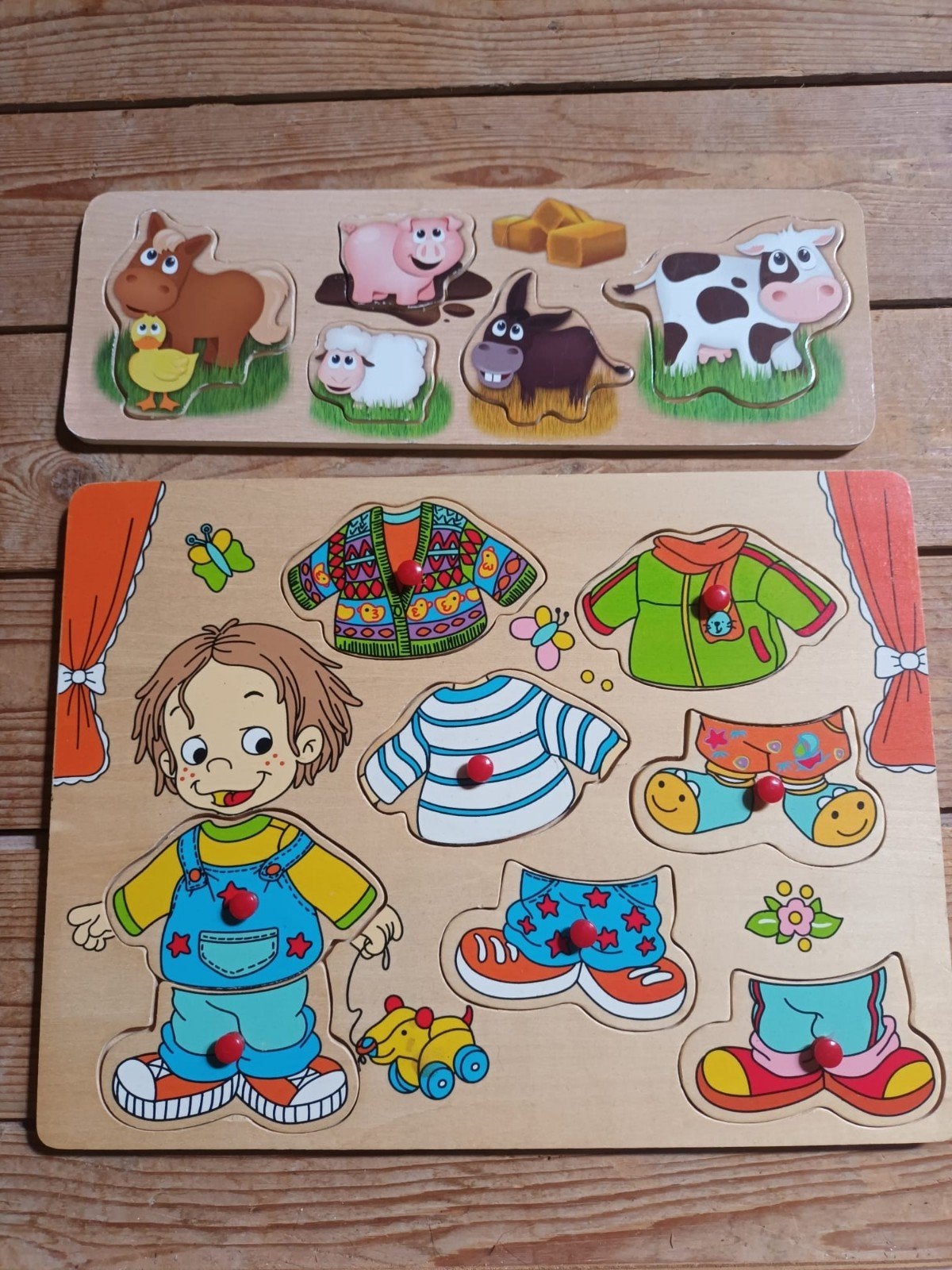 Houten puzzels: boerderijdieren en aankleedpop, Ophalen