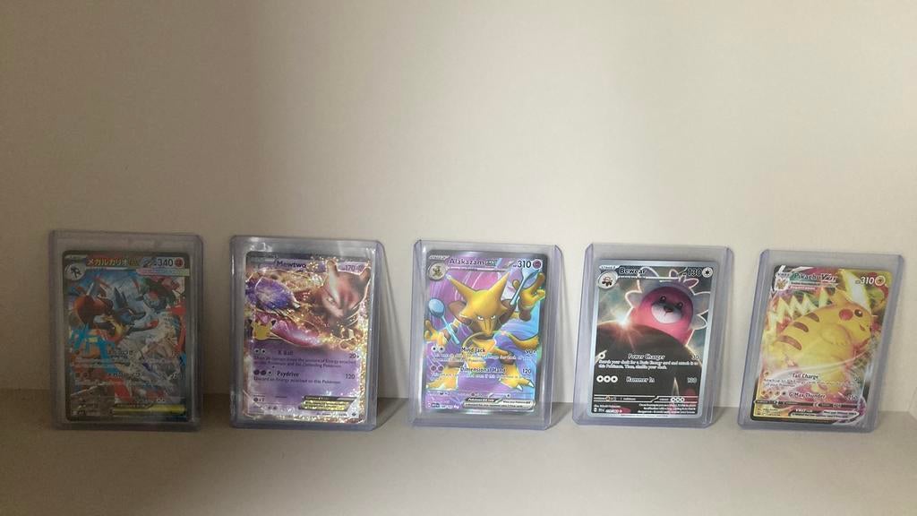 Bulk kaarten met o.a Bulbasaur stamped!, Ophalen of Verzenden, Zo goed als nieuw, Meerdere kaarten
