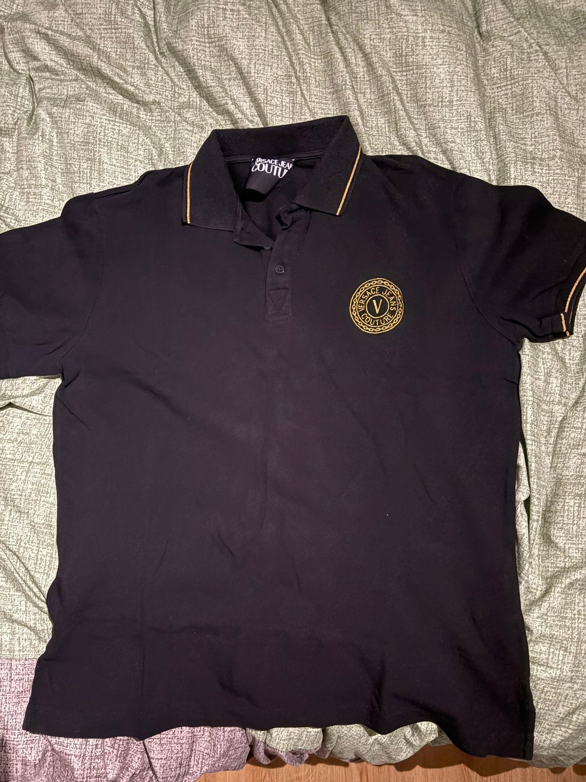 Versace polo, Ophalen of Verzenden, Zo goed als nieuw, Maat 48/50 (M), Zwart