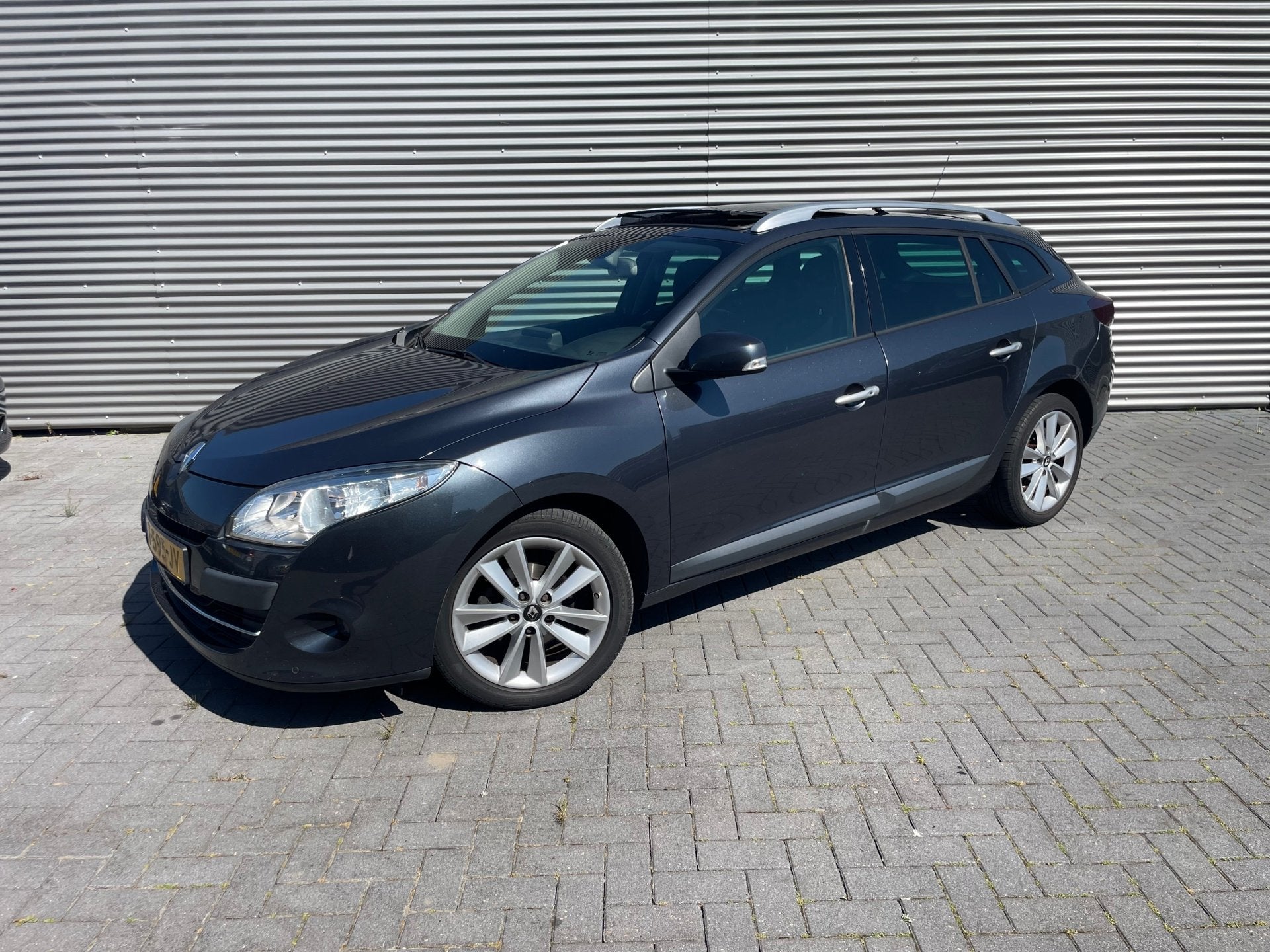 Renault Mégane Estate 1.4 TCe Privilége met panoramdak / n, Auto's, Voorwielaandrijving, Gebruikt, 4 cilinders, Leder en Stof