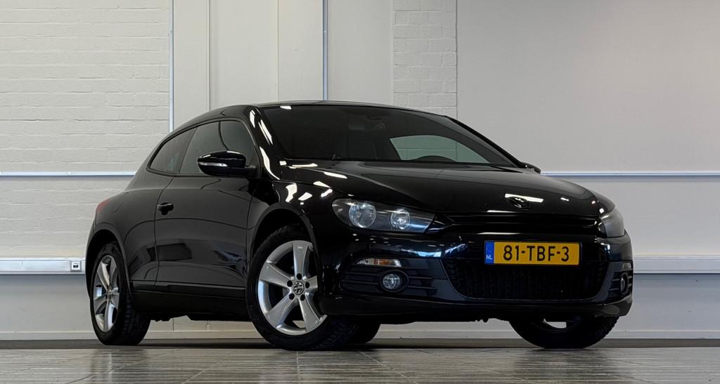 Volkswagen Scirocco 1.4 TSI Edition 3e Eigenaar Schuif/kante, Auto's, Euro 5, Stof, Gebruikt, Zwart
