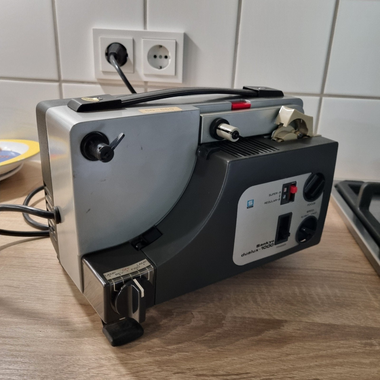 Vintage filmprojector Sankyo Dualux-1000, Ophalen
