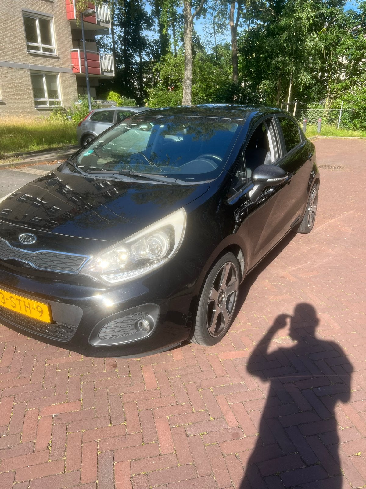 Kia Rio 1.2 I 5DRS 2011 Zwart Plus Pack., Auto's, 450 kg, 4 cilinders, Parkeersensor, Origineel Nederlands