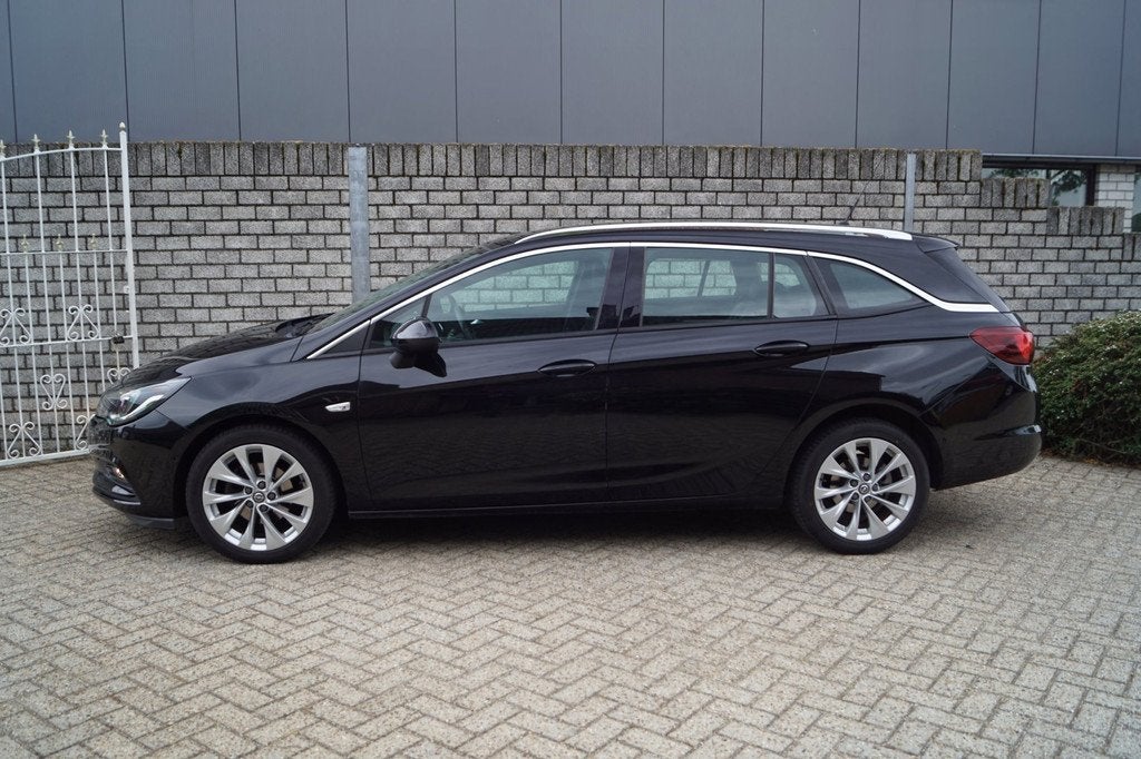 Opel Astra Sports Tourer 1.4 Turbo Innovation 150 PK Autom H, 150 pk, Leder en Stof, Zwart, 1399 cc