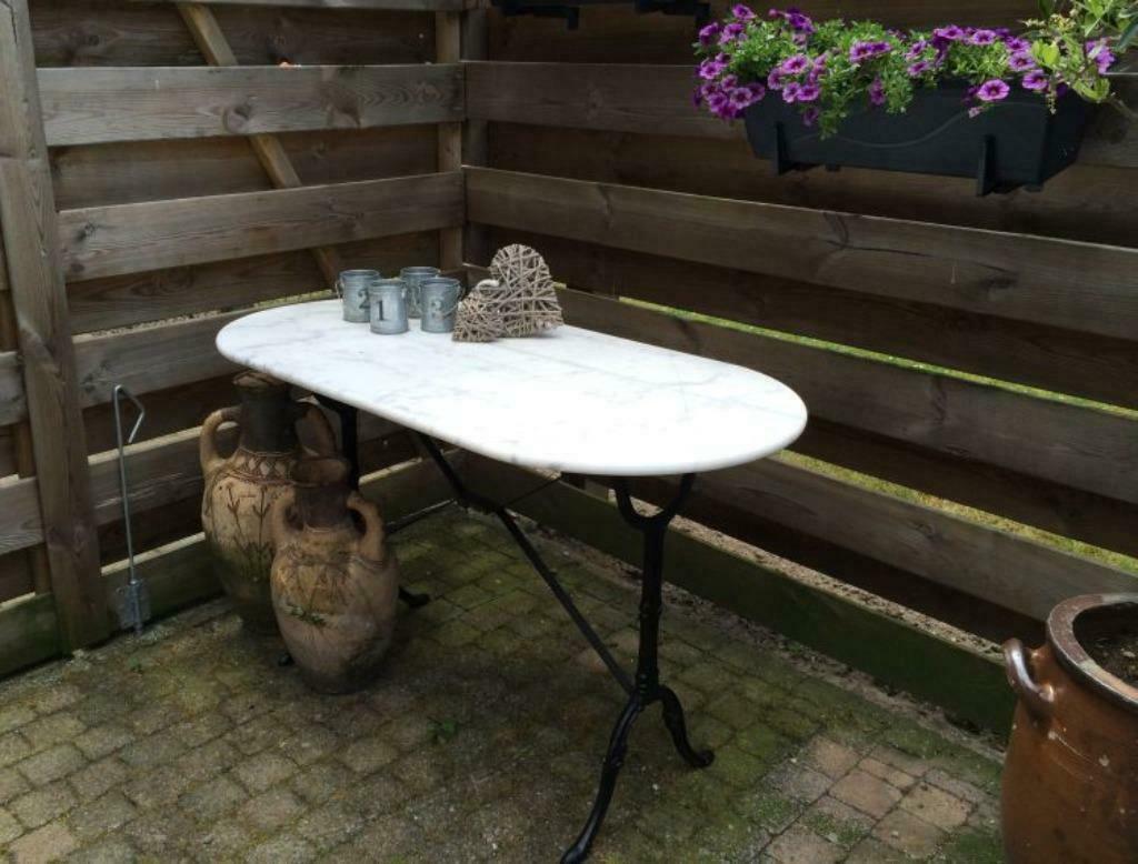 Ovaal marmeren terrastafel met gietijzer onderstel 120 x 60, Overige materialen, 100 tot 150 cm, Nieuw, Ovaal