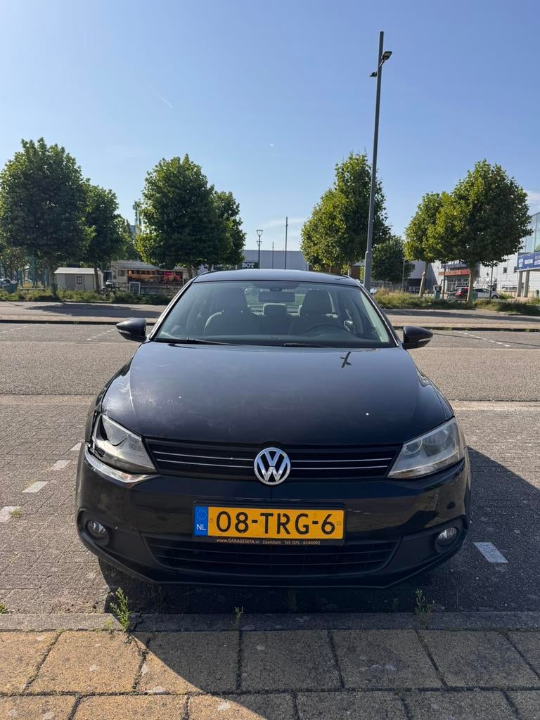 Volkswagen Jetta 1.2TSI 77KW H6 2012 Zwart. Export mogelijk, Voorwielaandrijving, 4 cilinders, Zwart, Origineel Nederlands