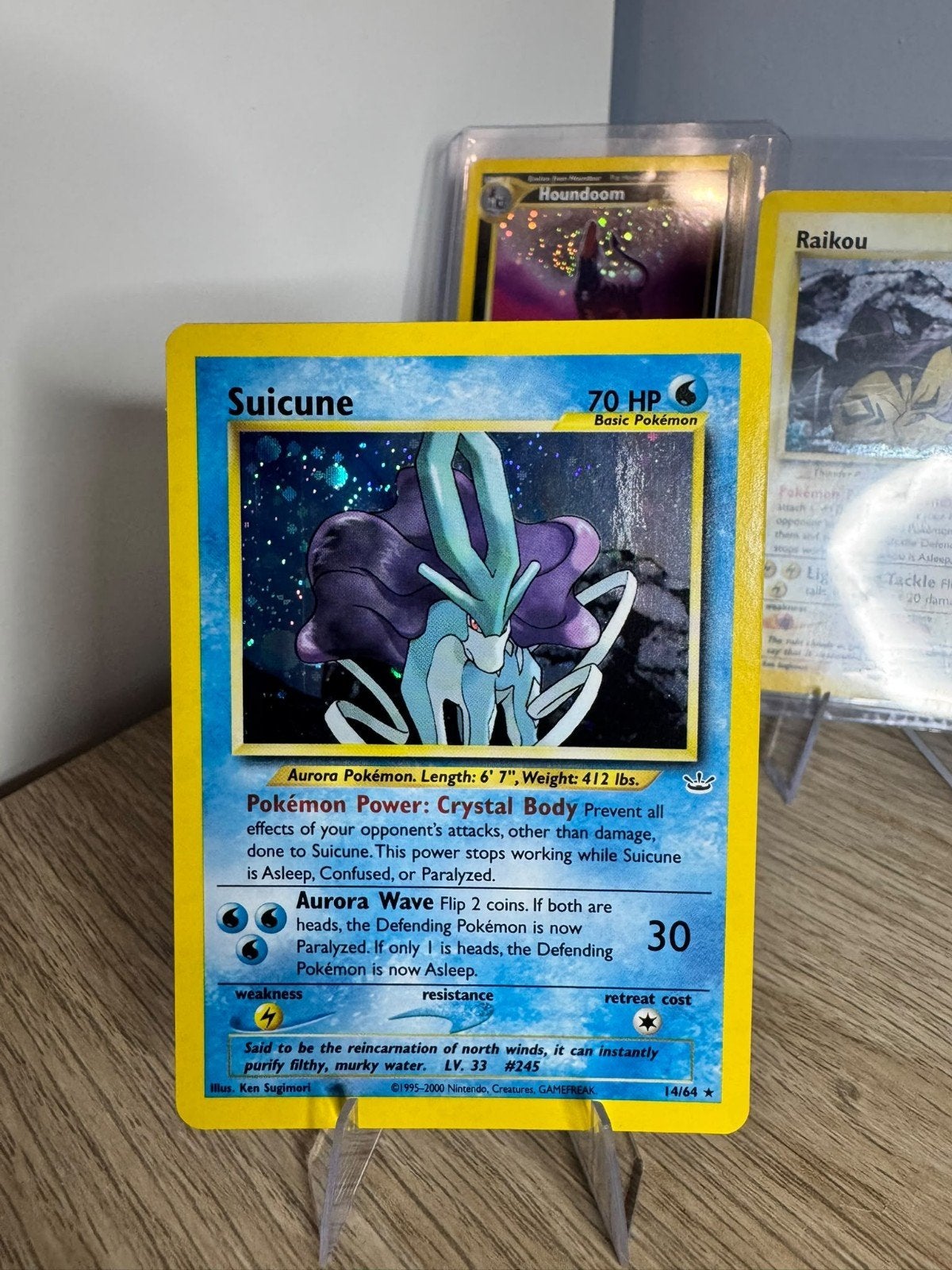 Pokémon Suicune 14/64 Neo Revelation Holo, Ophalen of Verzenden, Zo goed als nieuw, Losse kaart, Foil