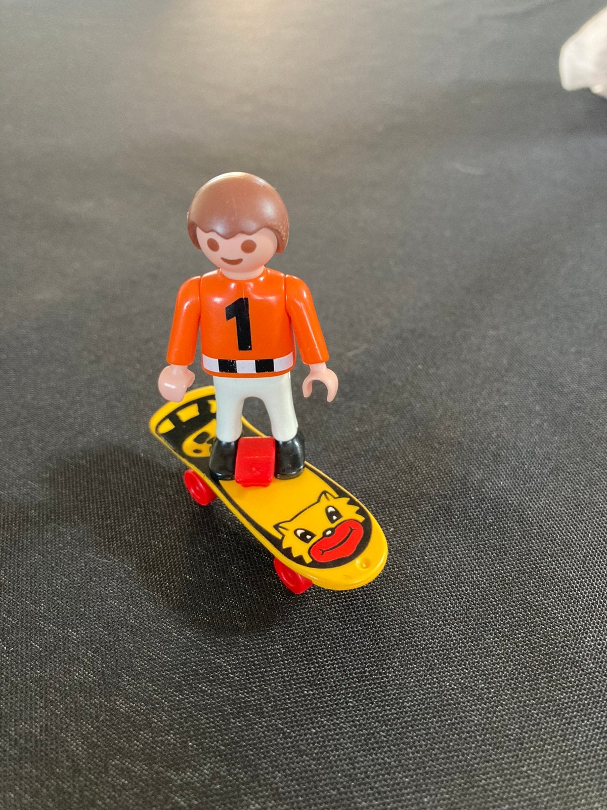 Playmobil jongen op skateboard., Ophalen of Verzenden, Zo goed als nieuw