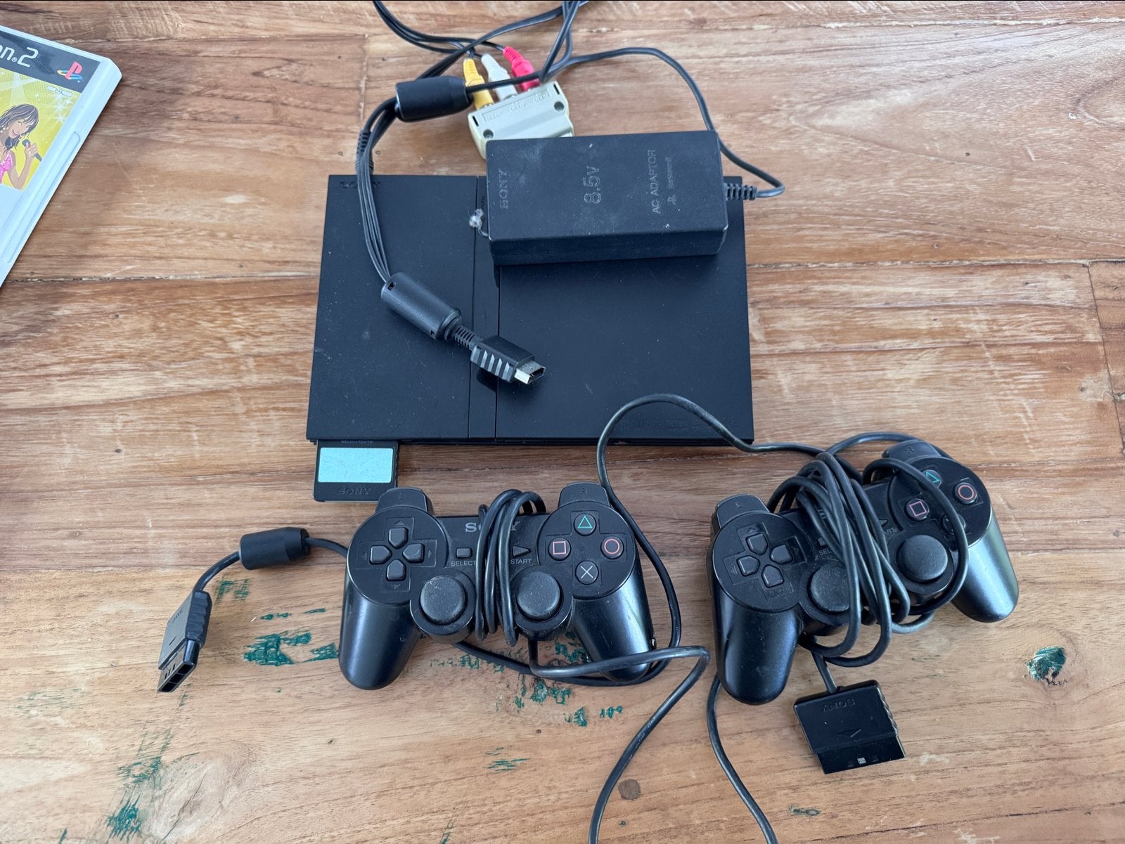 PlayStation 2 Slim met 2 controllers, 12 games en accessoire, Spelcomputers en Games, Zwart, Met 2 controllers, Ophalen of Verzenden