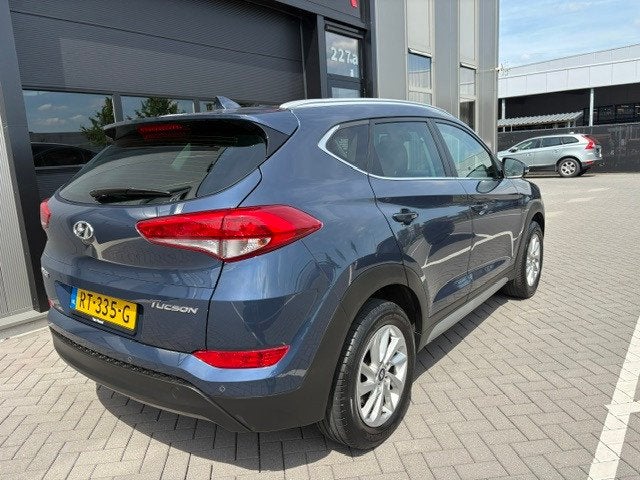 Hyundai Tucson 1.6 GDi Comfort, Auto's, Stof, Gebruikt, 4 cilinders, Blauw
