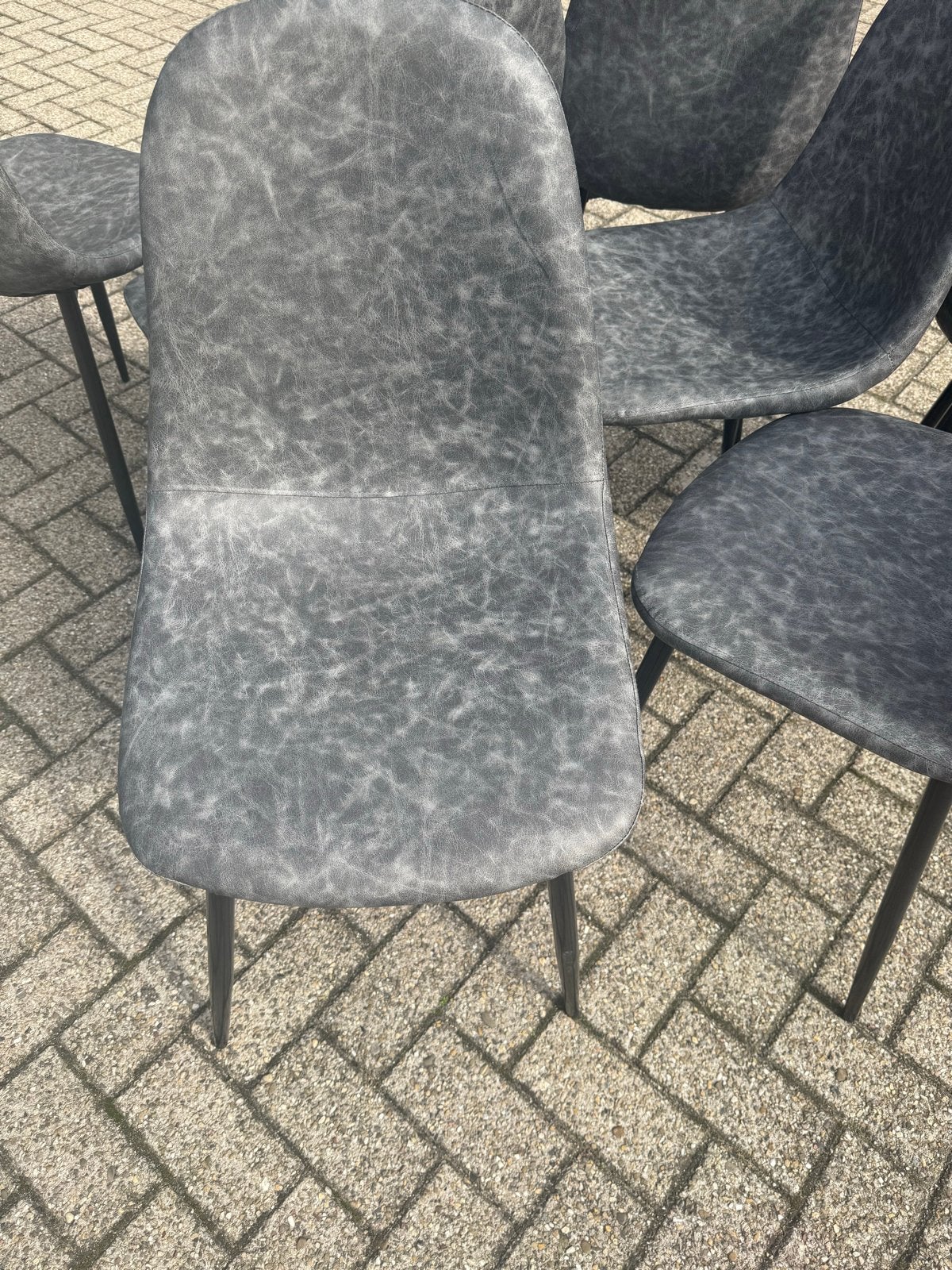 Set van 7 nieiwe grijze  eetkamerstoelen, Ophalen, Kunststof, Zo goed als nieuw, Grijs